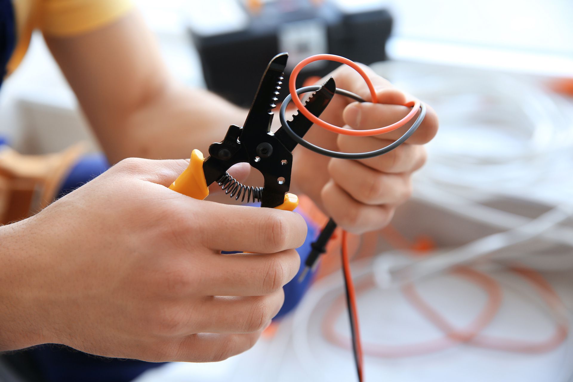 Electrician cutting wires